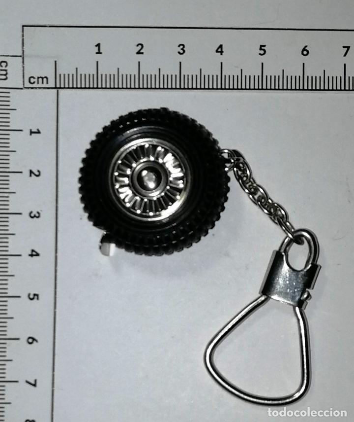 Collectionnisme de portes-cl&eacute;s: LLAVERO CINTA M&Eacute;TRICA 1 M. RUEDA, NEUM&Aacute;TICO. ELEPHANT F83 5211. - Made in Spain. - A&ntilde;os 80?