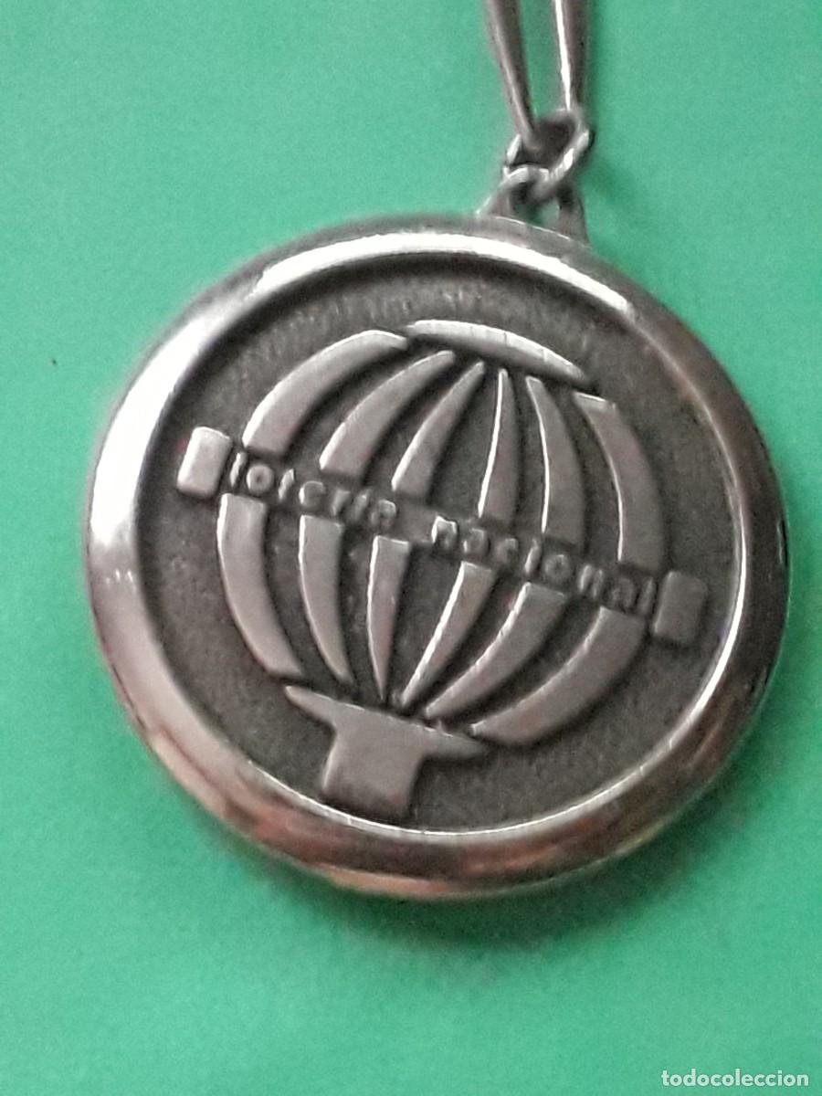 Collection of Keychains: LOTERIA NACIONAL BOMBO MAPAMUNDI - LLAVERO ANTIGUO DE EPOCA