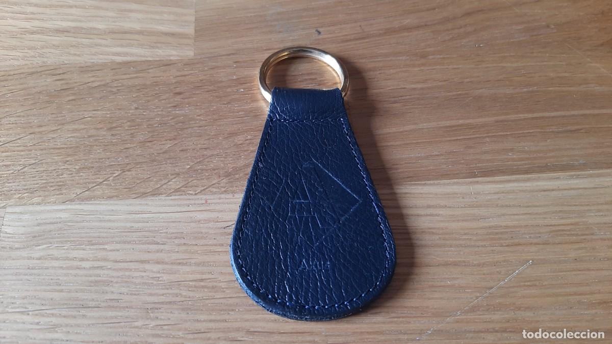 Coleccionismo de llaveros: Axus -- Llavero -- Impecable -- Cuero y metal dorado