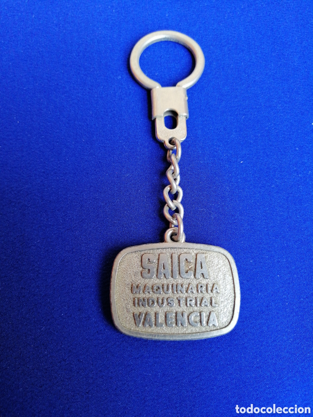 Collectionnisme de portes-cl&eacute;s: SAICA MAQUINARIA INDUSTRIAL VALENCIA - JOHN DEERE LLAVERO PUBLICIDAD AUTOMOCI&Oacute;N ANTIGUO