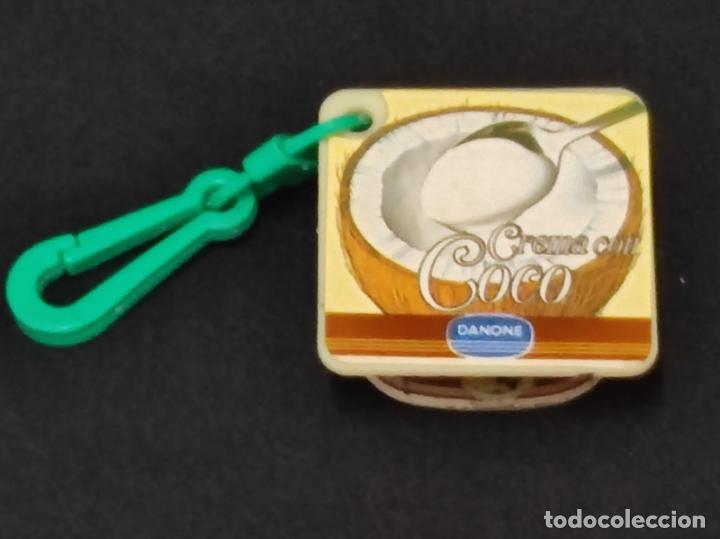 Coleccionismo de llaveros: ANTUGUO LLAVERO / MAQUINETA - DANONE - CREMA DE COCO (C24)