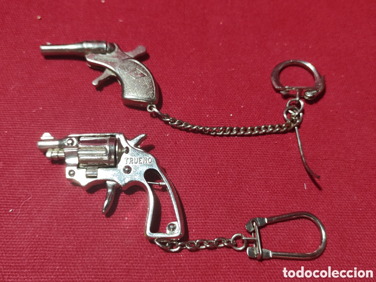 Coleccionismo de llaveros: Pareja llaveros pistola fulminantes leer descripci&oacute;n
