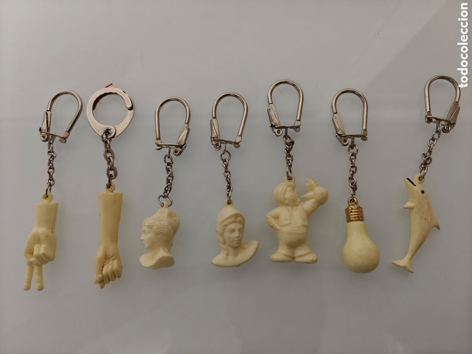 Coleccionismo de llaveros: 7x ANTIGUOS LLAVEROS PVC DIFERENTES BLANCOS