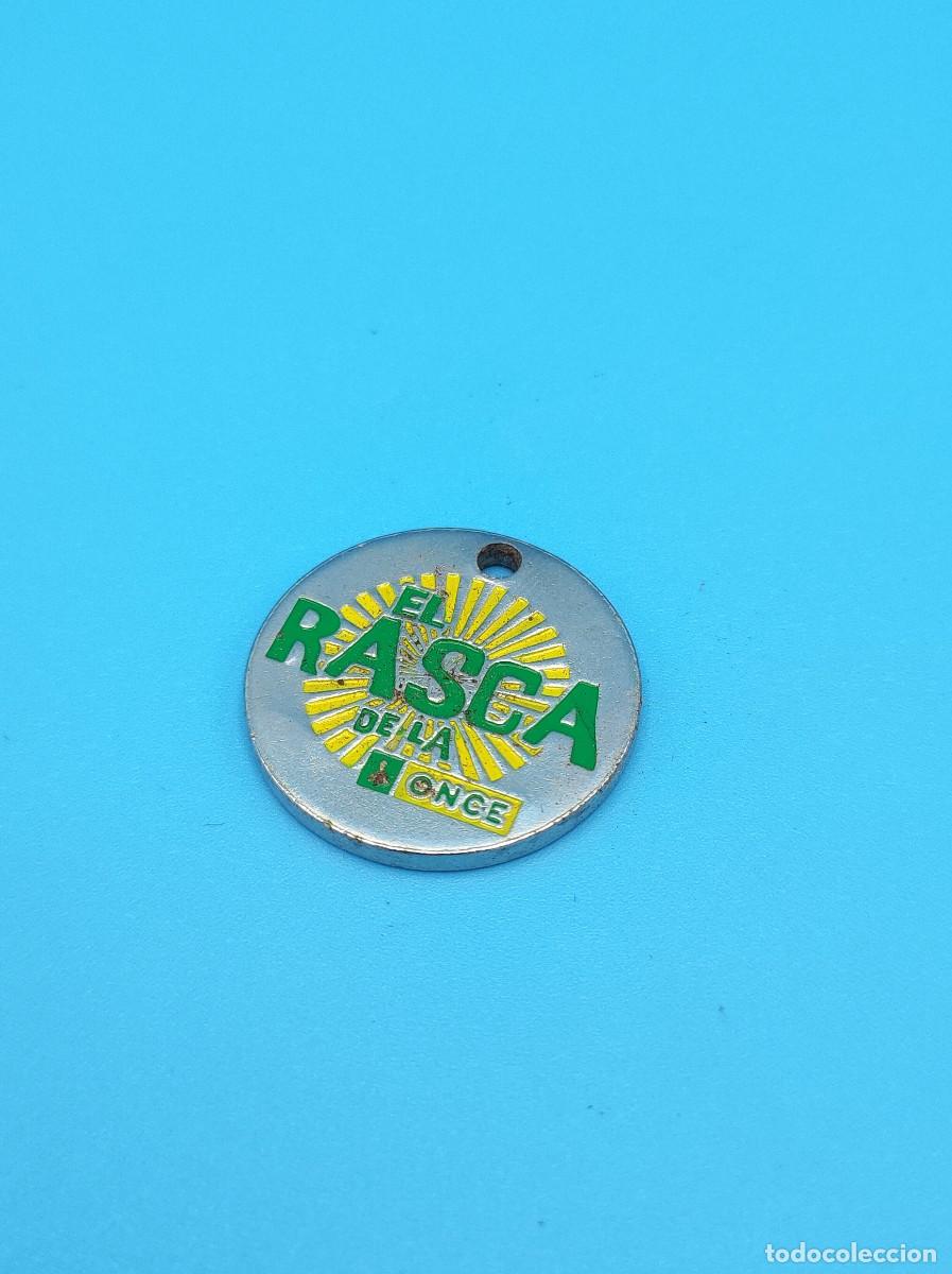 Sammlung von Schl&uuml;sselanh&auml;ngern: Llavero moneda El Rasca de la once