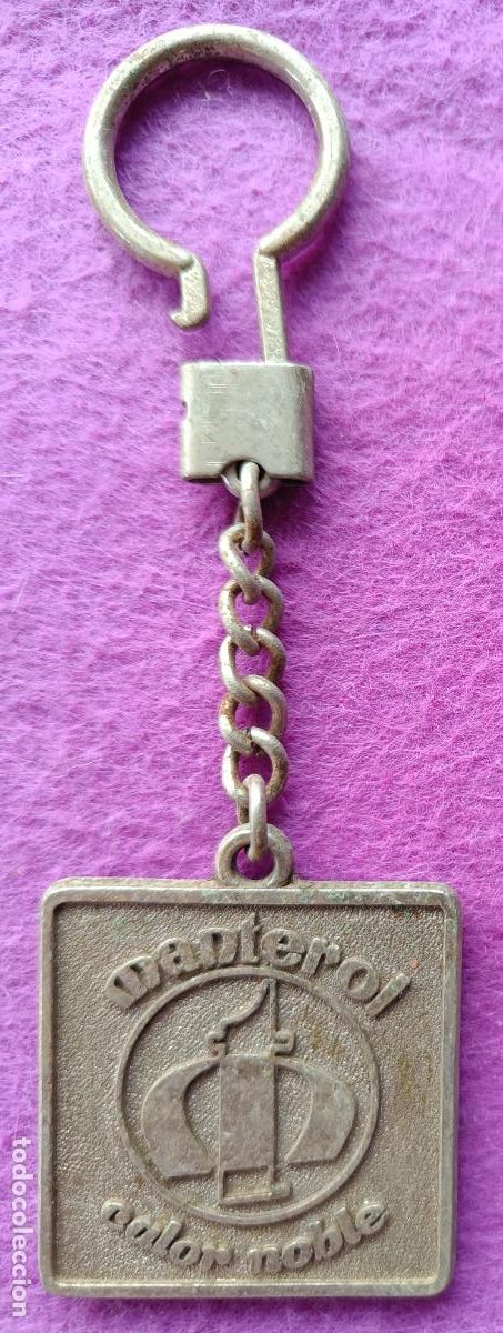 Collectionnisme de portes-cl&eacute;s: LLAVERO PUBLICIDAD MANTEROL CALOR NOBLE METALICO VER FOTO TRASERA
