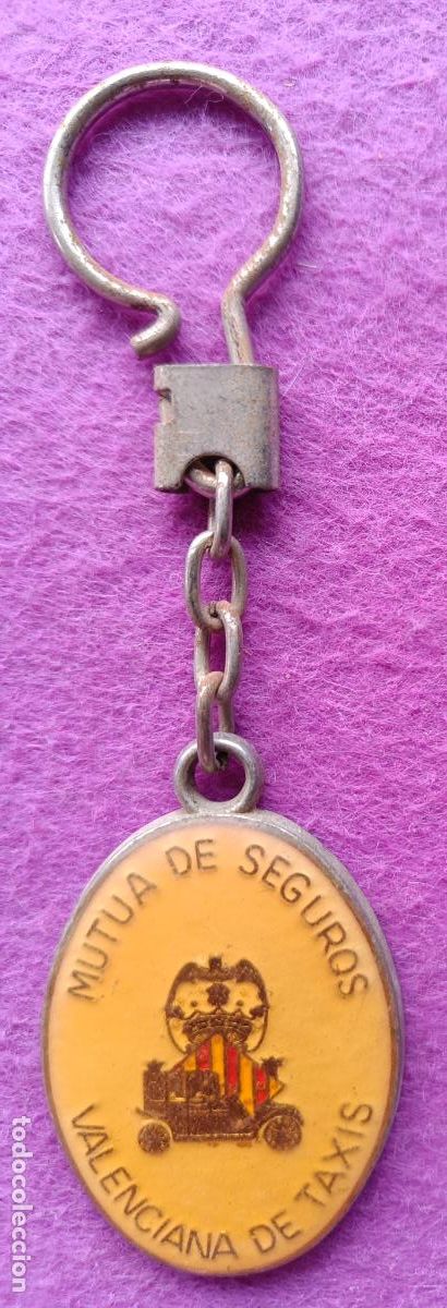 Collectionnisme de portes-cl&eacute;s: LLAVERO PUBLICIDAD MUTUA DE SEGUROS VALENCIANA DE TAXIS METALICO VER FOTO TRASERA