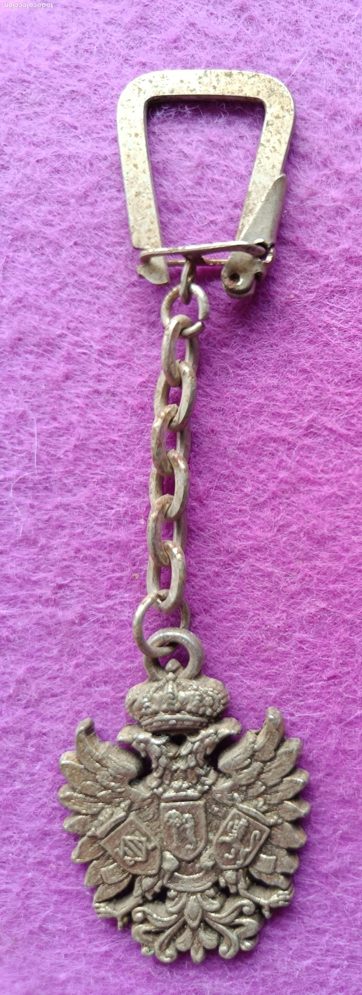 Collectionnisme de portes-cl&eacute;s: LLAVERO PUBLICIDAD CERVEZA AGUILA IMPERIAL CERVEZA DE ESPA&Ntilde;A METALICO VER FOTO TRASERA