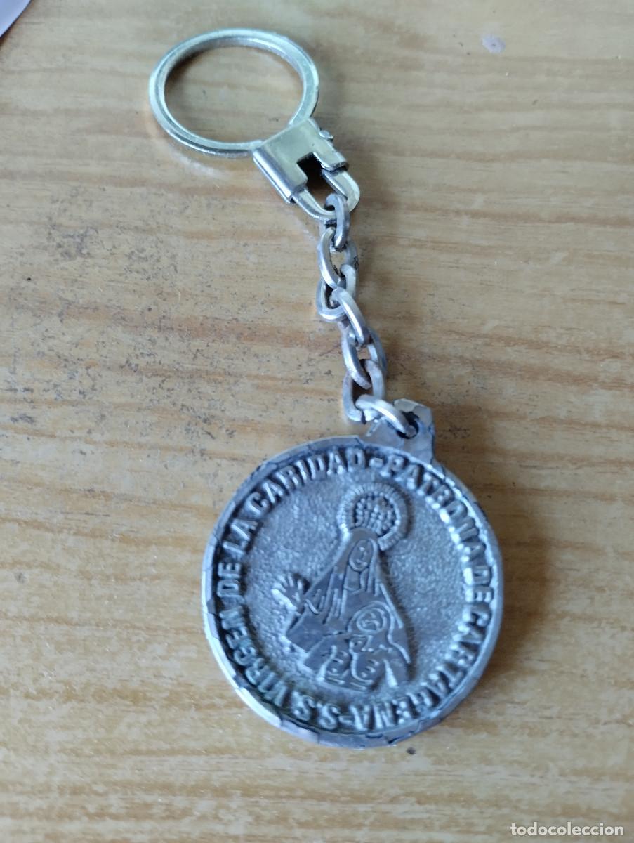 Coleccionismo de llaveros: llavero de la virgen de la caridad de cartagena y por detras autoescuela la union