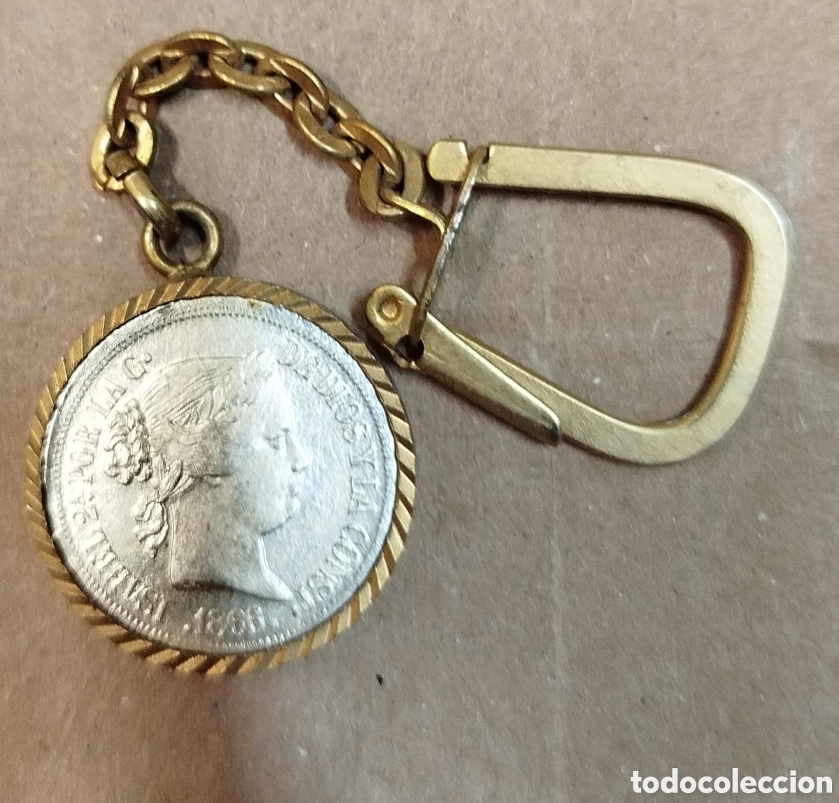 Collectionnisme de portes-cl&eacute;s: Llavero replica moneda Isabel Segunda