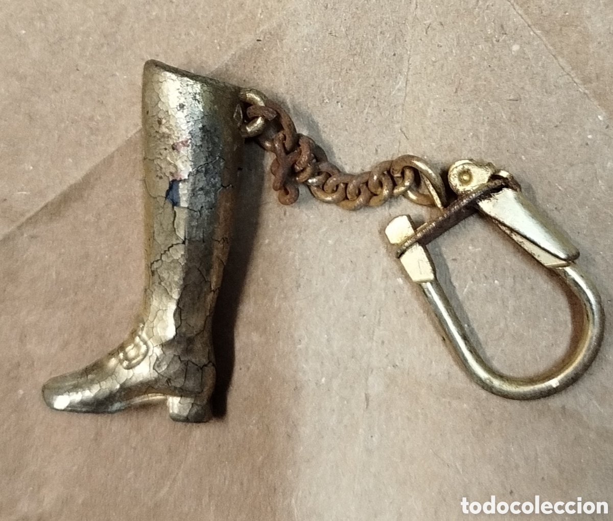 Collezionismo di Portachiavi: Llavero bota metal dorada