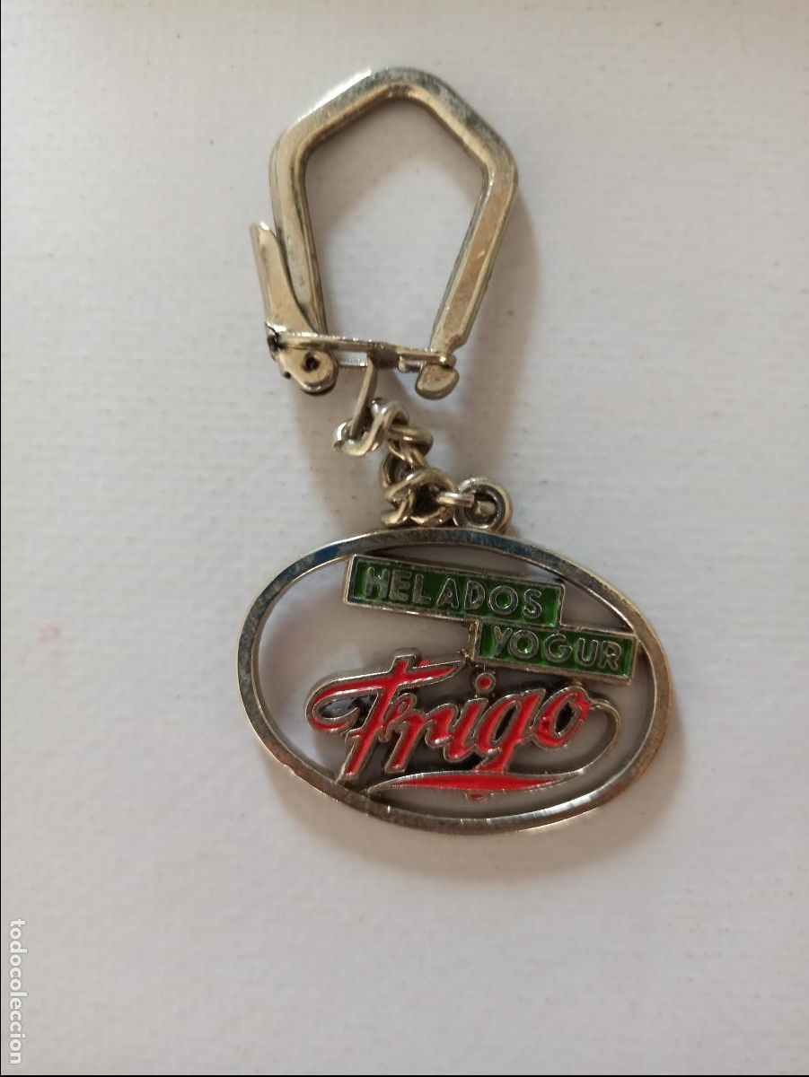 Sammlung von Schl&uuml;sselanh&auml;ngern: LLAVERO DE METAL TROQUELADO - HELADOS YOGUR FRIGO (116C)