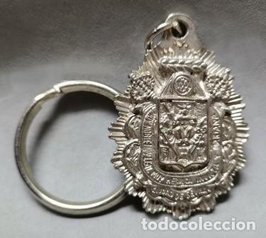 Collection of Keychains: LLAVERO DE METAL ESCUDO DE SEVILLA CORREDOR DE SEGUROS JOSE M. G. - LLAV-28319 - B-1081
