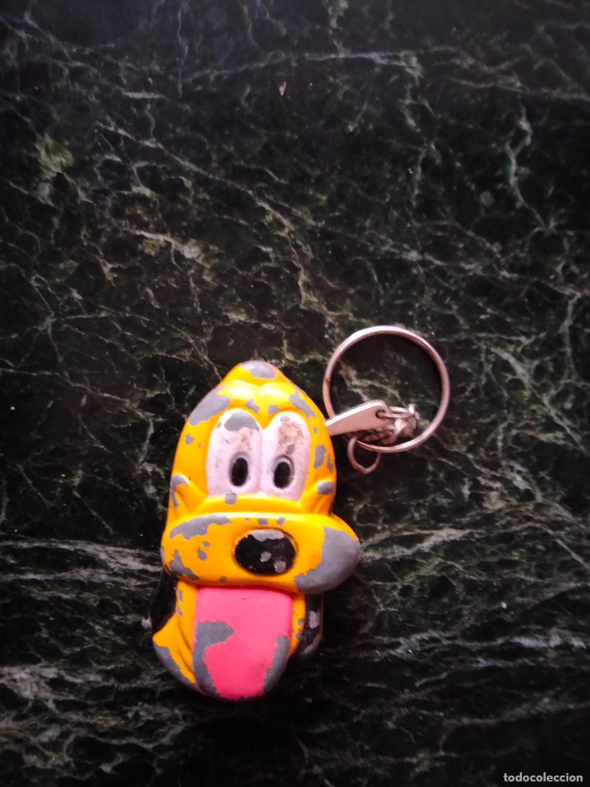 Collectionnisme de portes-cl&eacute;s: Llavero encendedor de Pluto.