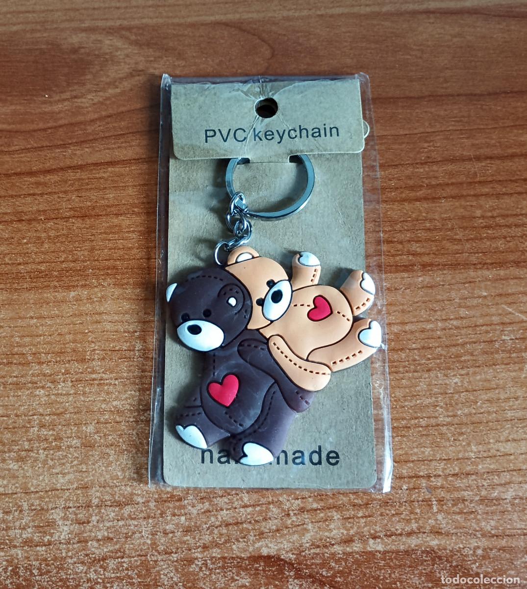 Collectionnisme de portes-cl&eacute;s: Llavero de goma con dos ositos