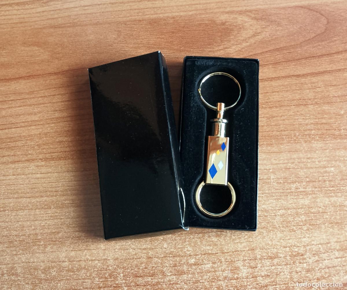 Coleccionismo de llaveros: Llavero de metal del Grupo Empresa CASA de Sevilla