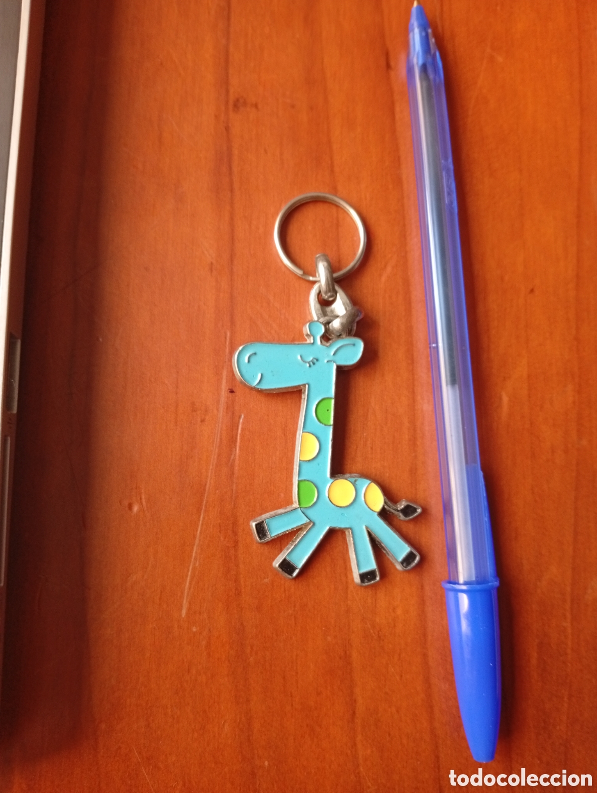 Sammlung von Schl&uuml;sselanh&auml;ngern: LLAVERO JIRAFA AZUL ESMALTADA ?