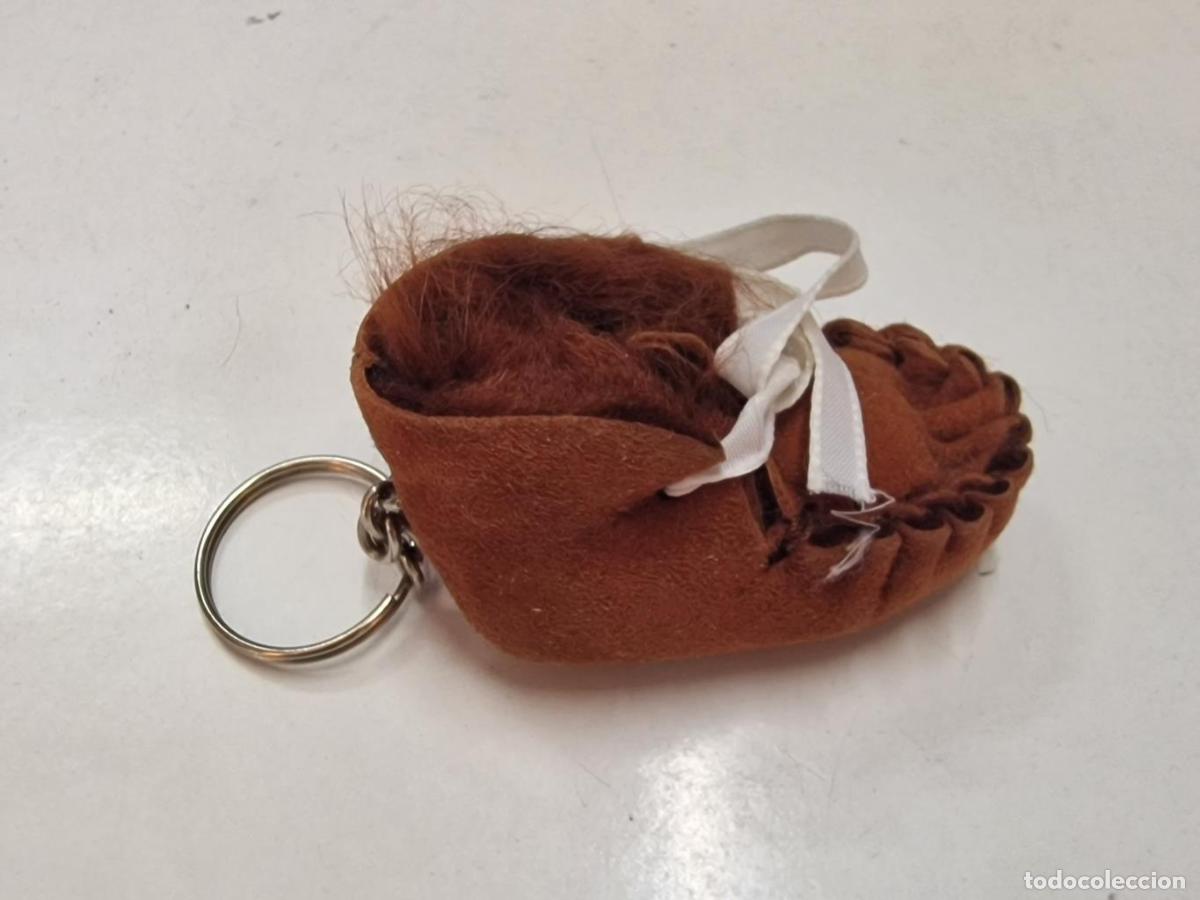 Collectionnisme de portes-cl&eacute;s: Llavero: replica de un mocas&iacute;n de bebe