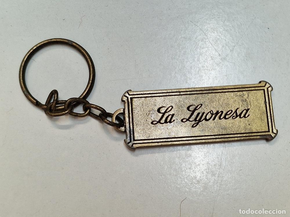 Collectionnisme de portes-cl&eacute;s: Llavero: La Lyonesa, 65&egrave; aniversari pastisseria-bomboner&iacute;a (L'Hospitalet)
