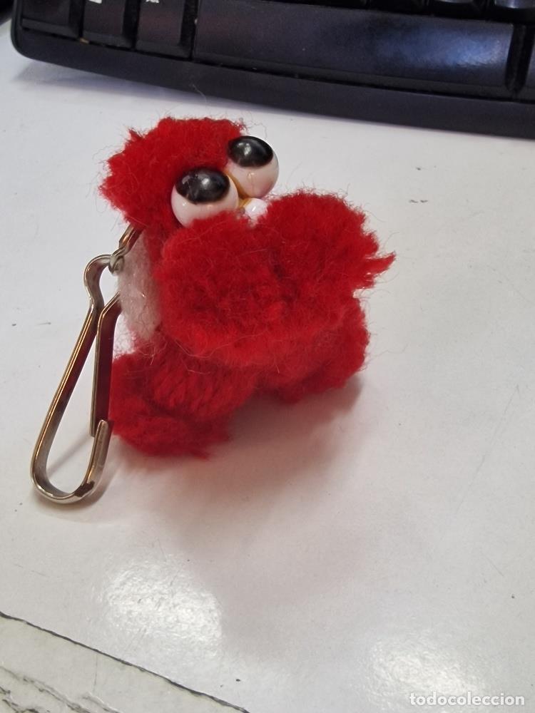 Collectionnisme de portes-cl&eacute;s: Llavero: peluche con ojos saltones
