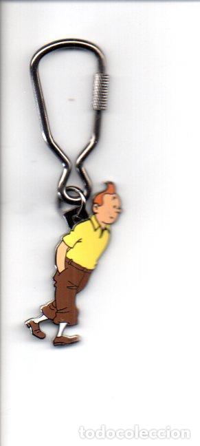 Coleccionismo de llaveros: V49181: Llavero metalico de la figura de Tintin con jersey amarillo.