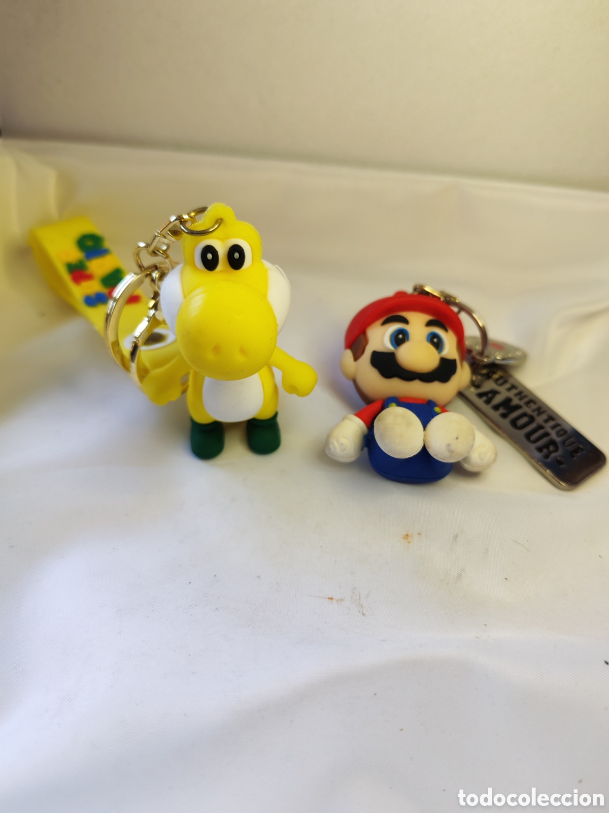Coleccionismo de llaveros: Llaveros Super Mario y Yoshi amarillo. Nintendo.