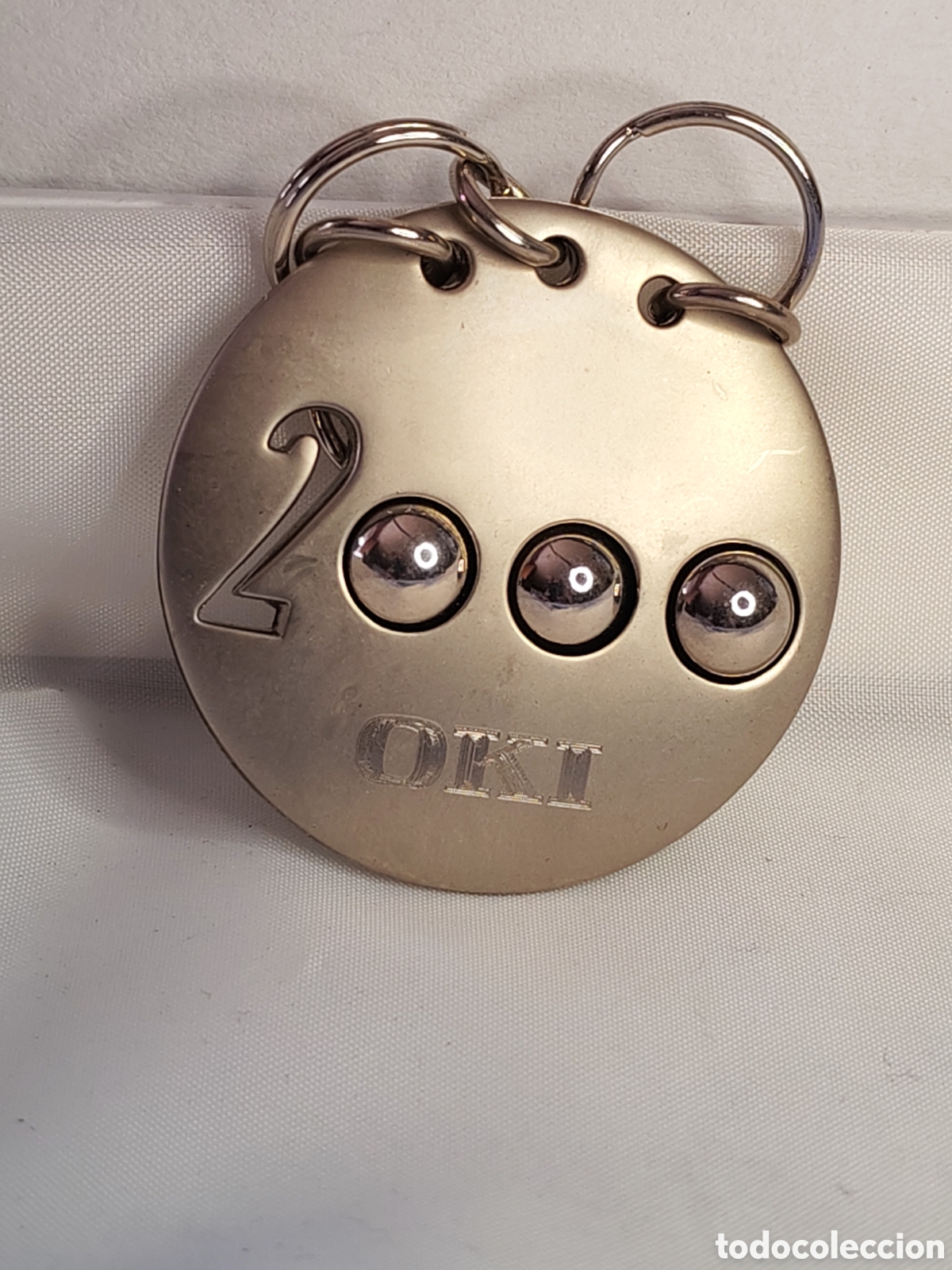 Coleccionismo de llaveros: Llavero conmemorativo a&ntilde;o 2000. Regalo promocional clientes OKI. 2000 (CL)