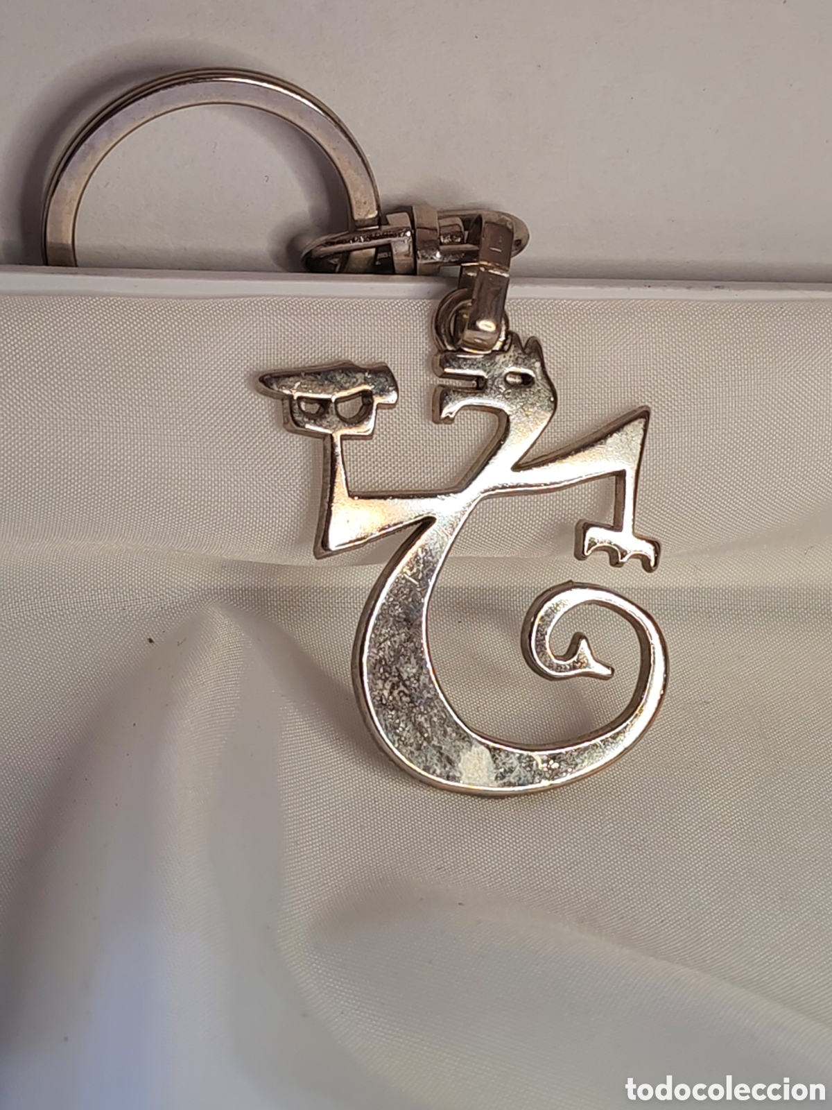 Coleccionismo de llaveros: Llavero de la coleccion de la dise&ntilde;adora Sara Navarro. (CL)