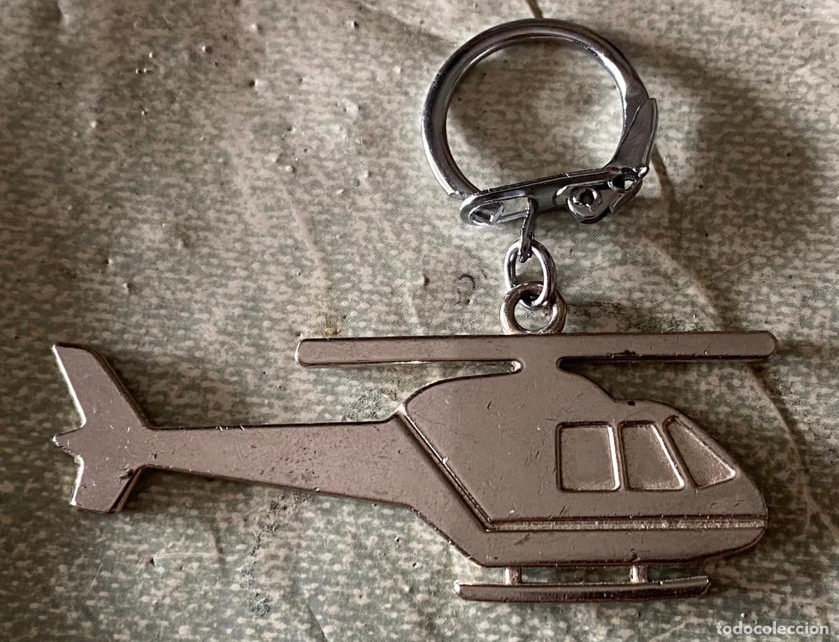 Coleccionismo de llaveros: Llavero met&aacute;lico. Helic&oacute;ptero. Con el nombre 'Ra&uacute;l' grabado al dorso. A&ntilde;os 90. Buen estado.