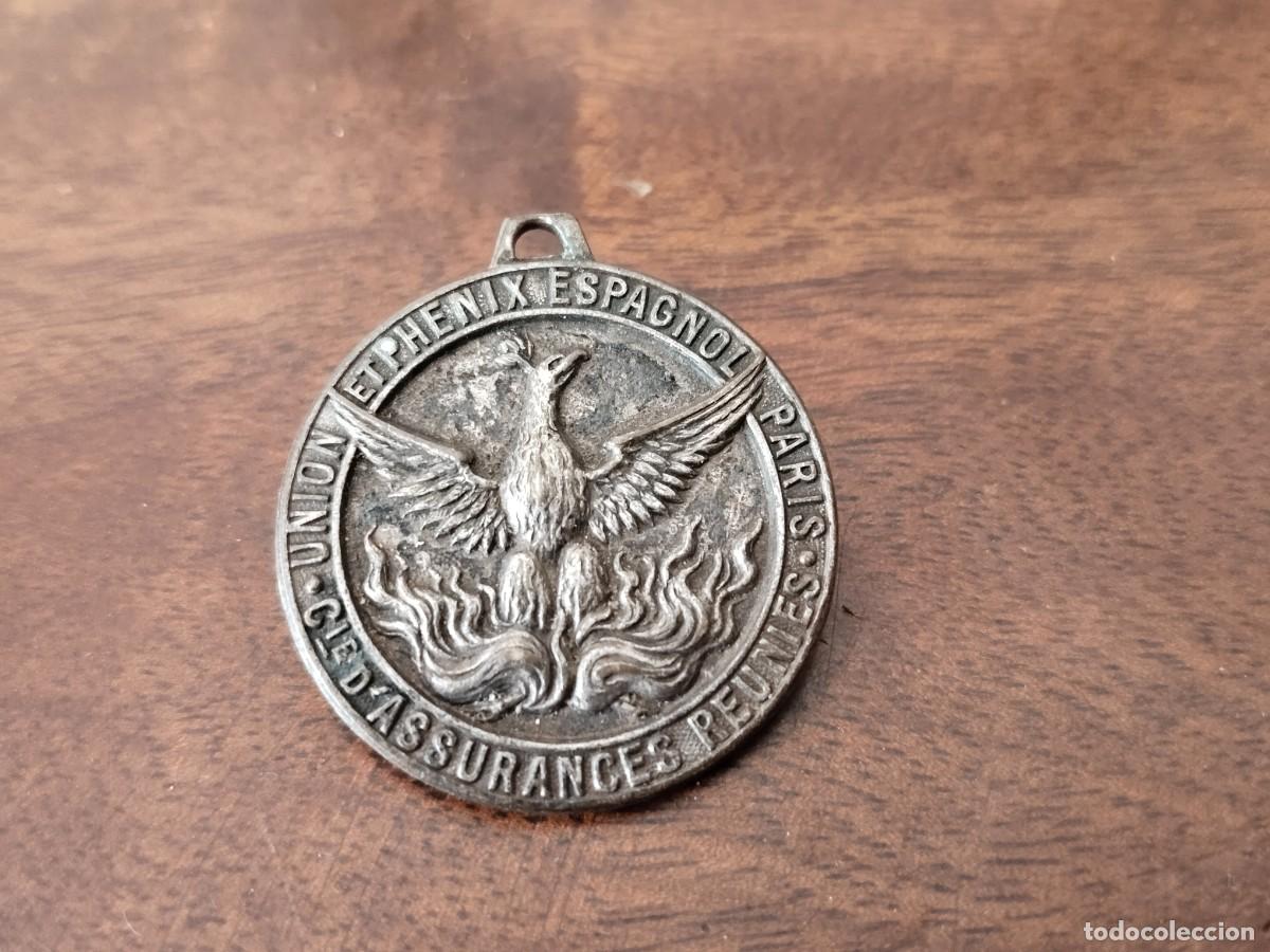 Colecionismo de porta-chaves: Antigua Medalla para llavero Seguros La Uni&oacute;n y el F&eacute;nix Espa&ntilde;ol. En franc&eacute;s Par&iacute;s. San Crist&oacute;bal .