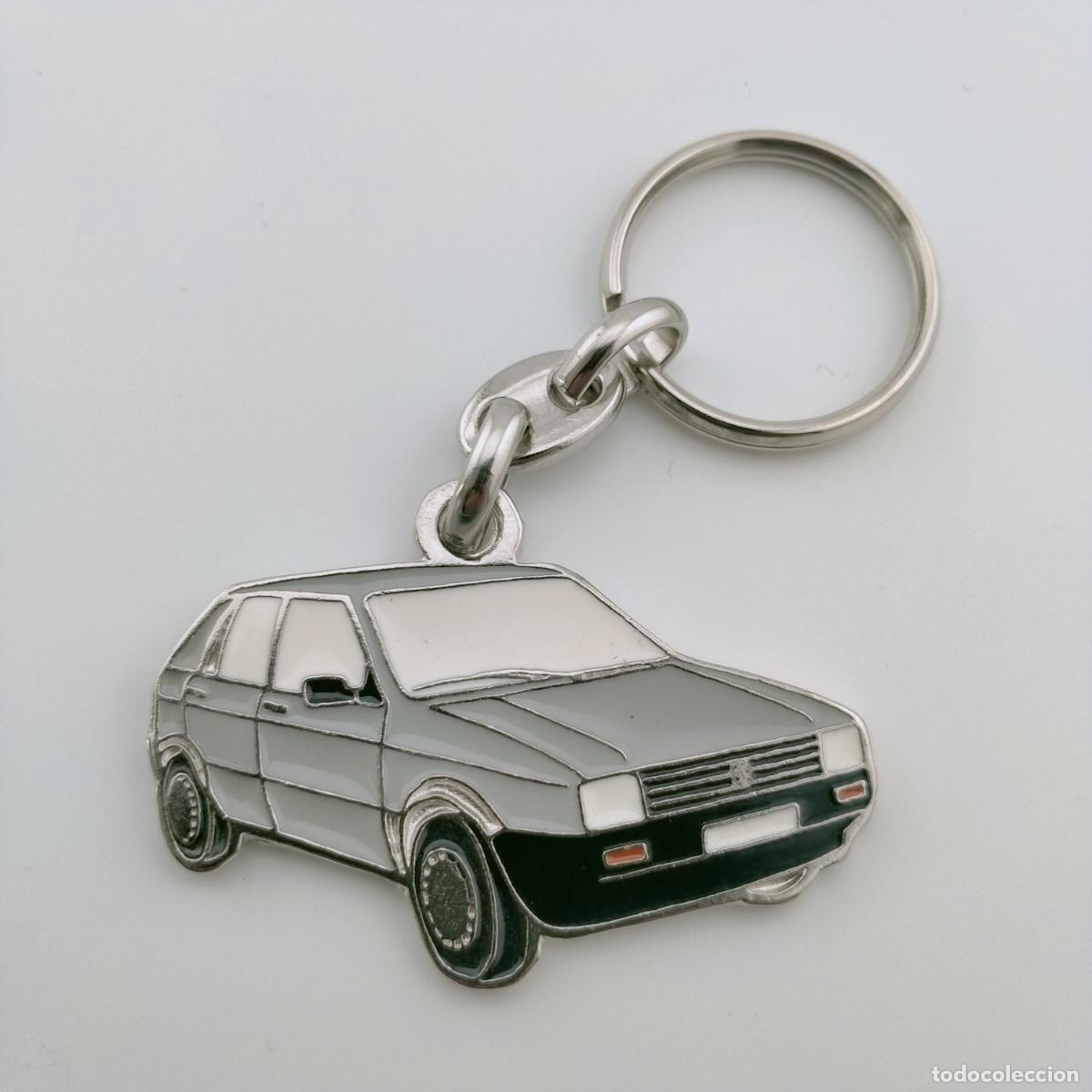 Collection of Keychains: llavero seat ibiza gris