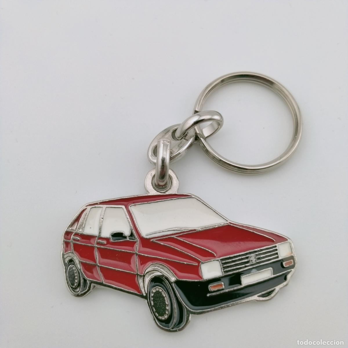 Collection of Keychains: llavero seat ibiza rojo