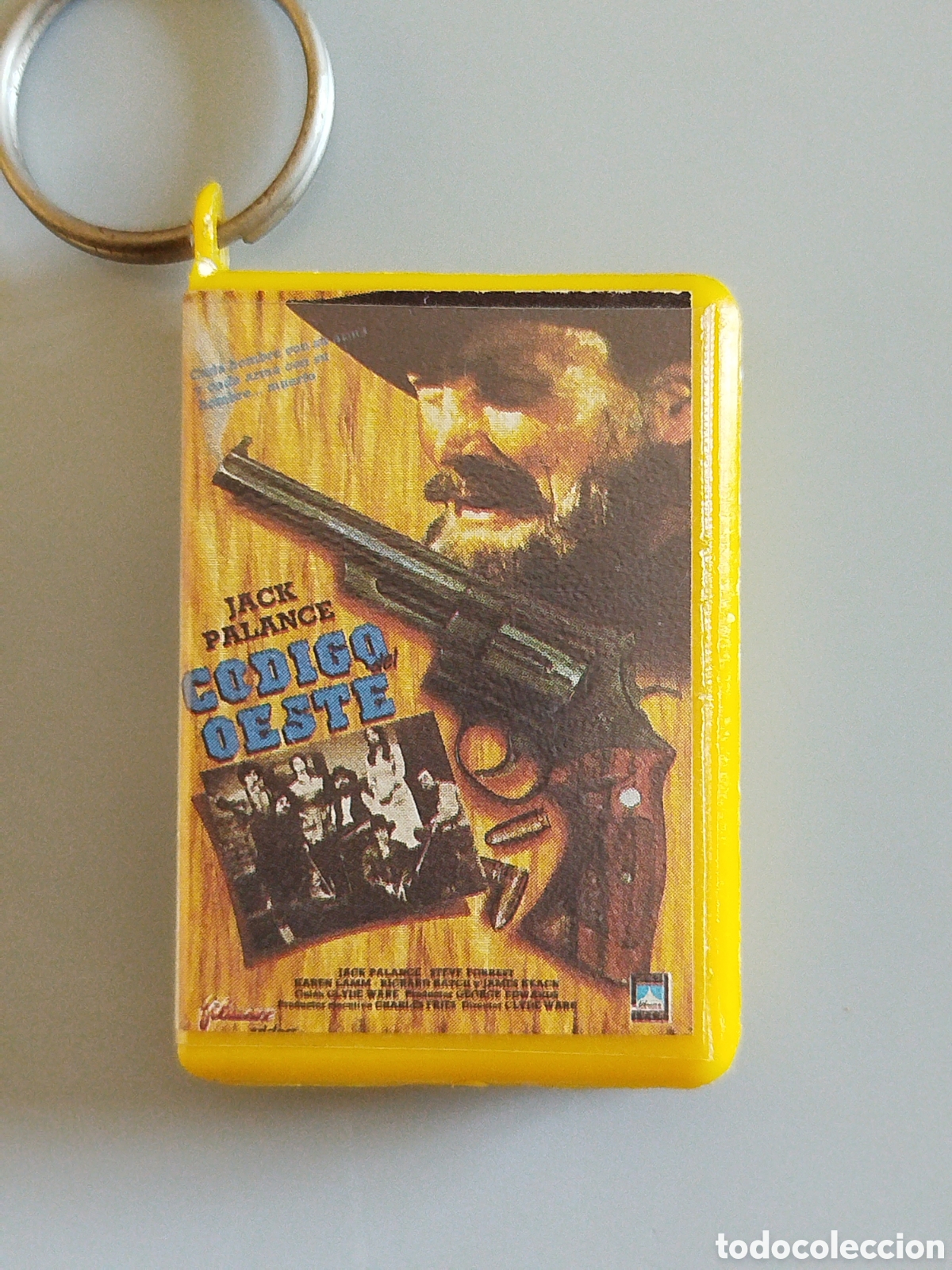 Coleccionismo de llaveros: ANTIGUO LLAVERO MINIATURA CARATULA CINTA VHS. PELICULA &rdquo; CODIGO OESTE &rdquo; JACK PALANCE