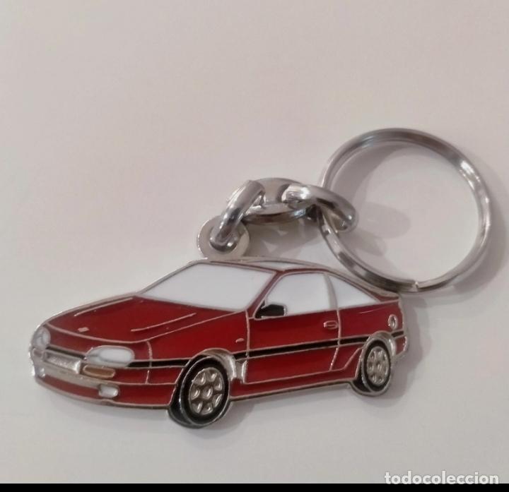 Coleccionismo de llaveros: Llavero nissan 100X rojo