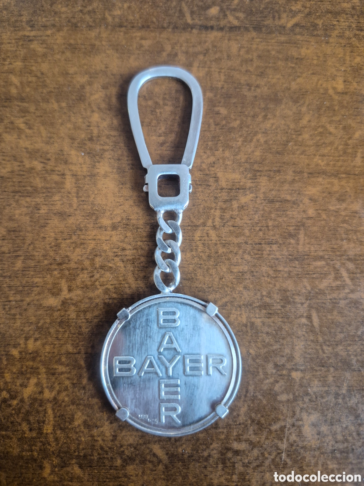 Collectionnisme de portes-cl&eacute;s: LLAVERO PLATA 999 , BAYER 25 A&Ntilde;OS 1966-1991