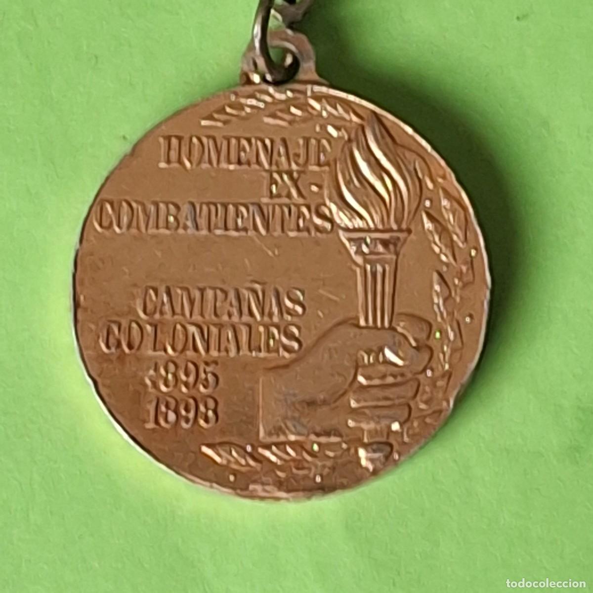 Collectionnisme de portes-cl&eacute;s: LLAVERO - HOMENAJE EXCOMBATIENTES CAMPA&Ntilde;AS COLONIALES 1895 1898 - TIPO MEDALLA MILITAR