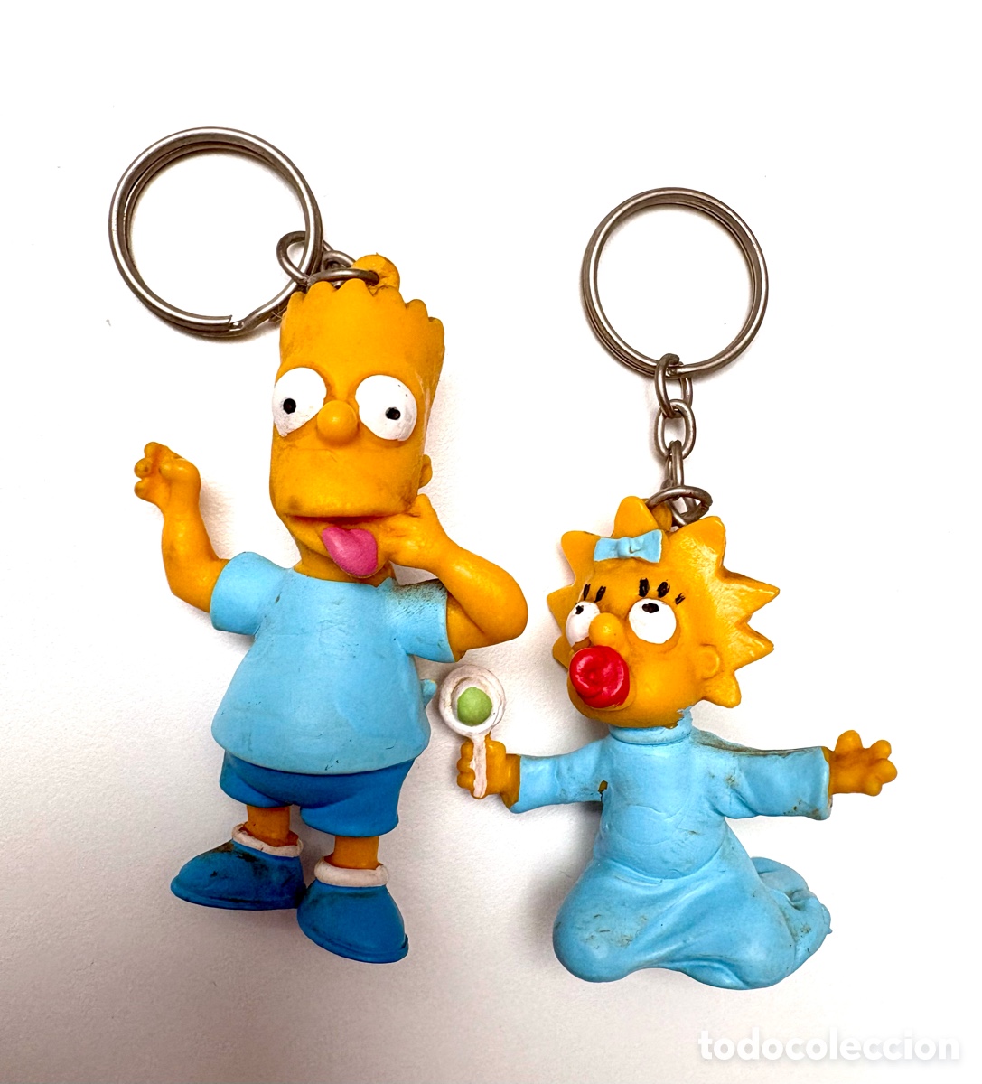 Coleccionismo de llaveros: Lote 2 Llaveros Vintage Los Simpson (1990) - Miniland (Onil, Alicante) | Bart y Maggie PVC