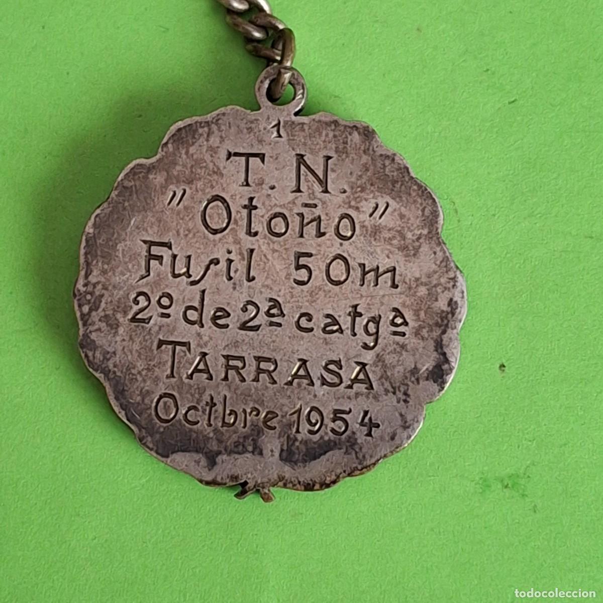 Collection of Keychains: LLAVERO - TORNEO OTO&Ntilde;O TIRO FUSIL 50m. TARRASA OCTUBRE 1954 - CLUB DE TIR ? - TIPO MEDALLA