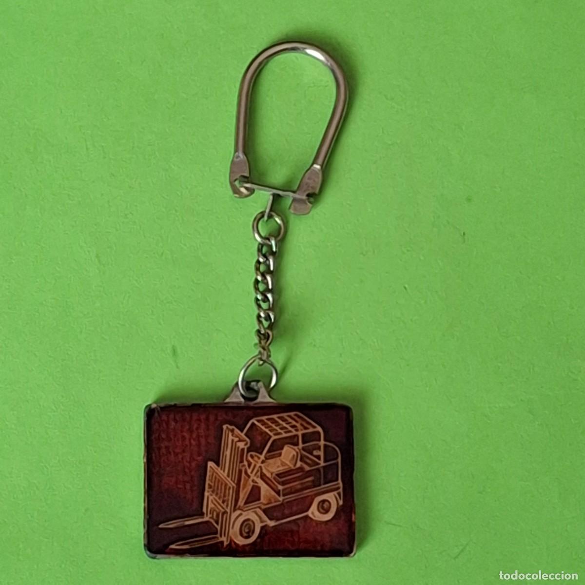 Collection of Keychains: LLAVERO - RIBAS TRANSERVICIOS SA - CARRETILLAS CARRETILLA ELEVADORA TORO