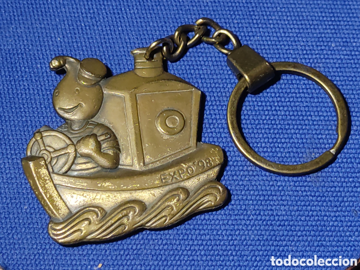 Coleccionismo de llaveros: Llavero mascota Gil de la EXPO 98 de bronce o laton.