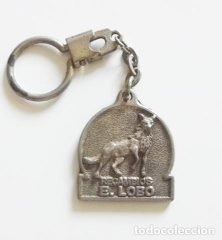 Coleccionismo de llaveros: LLAVERO RECAMBIOS E. LOBO - PUBLICIDAD DE ACC. Y REPUSTOS DE COCHE - LOBO EN RELIEVE - SEVILLA