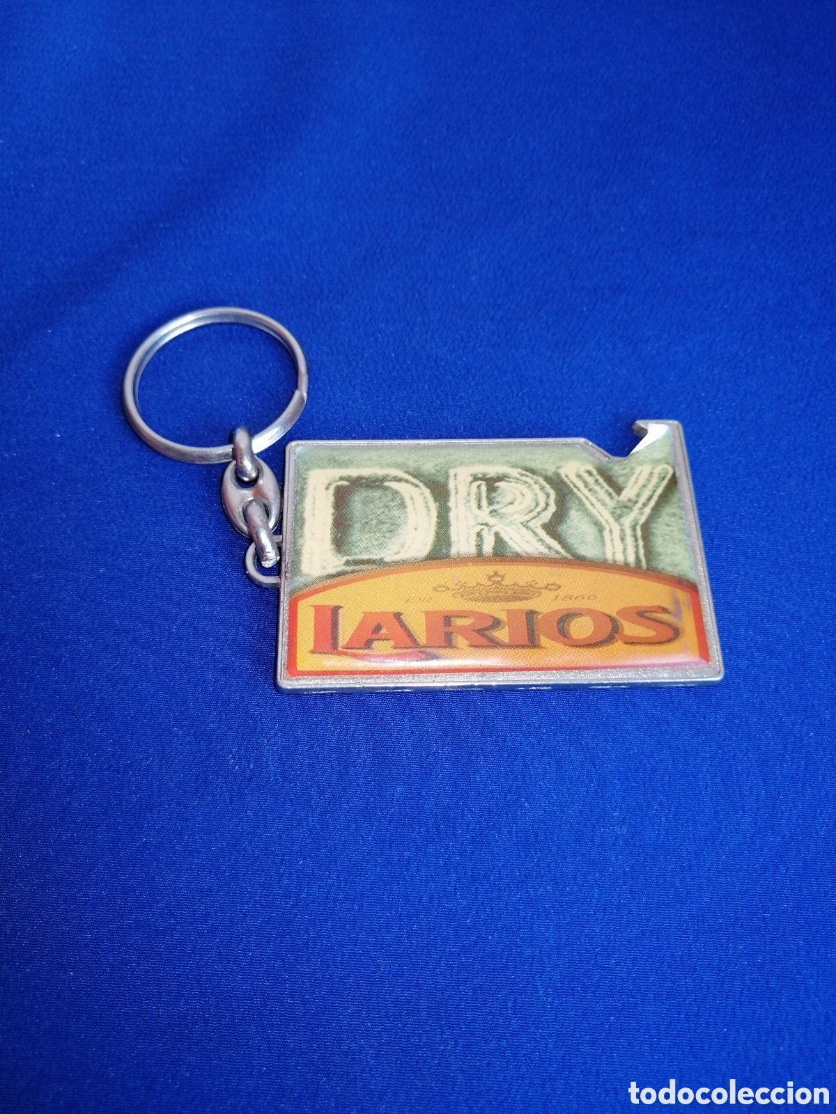 Collectionnisme de portes-cl&eacute;s: LARIOS DRY - ABRIDOR GINEBRA LLAVERO PUBLICIDAD