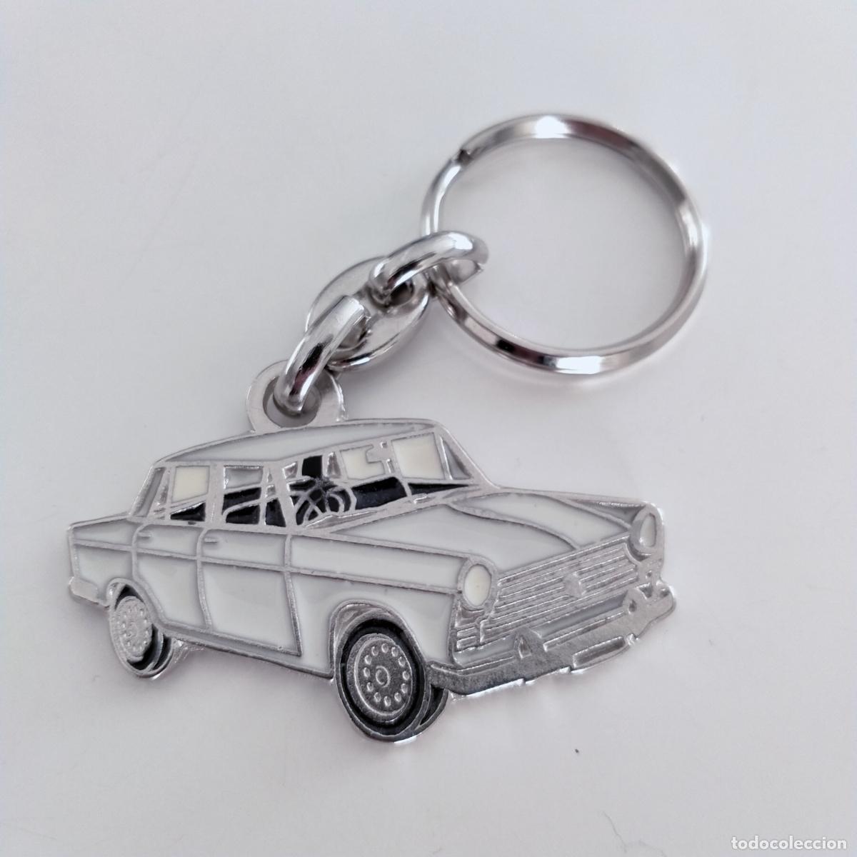 Collectionnisme de portes-cl&eacute;s: llavero seat 1500 blanco