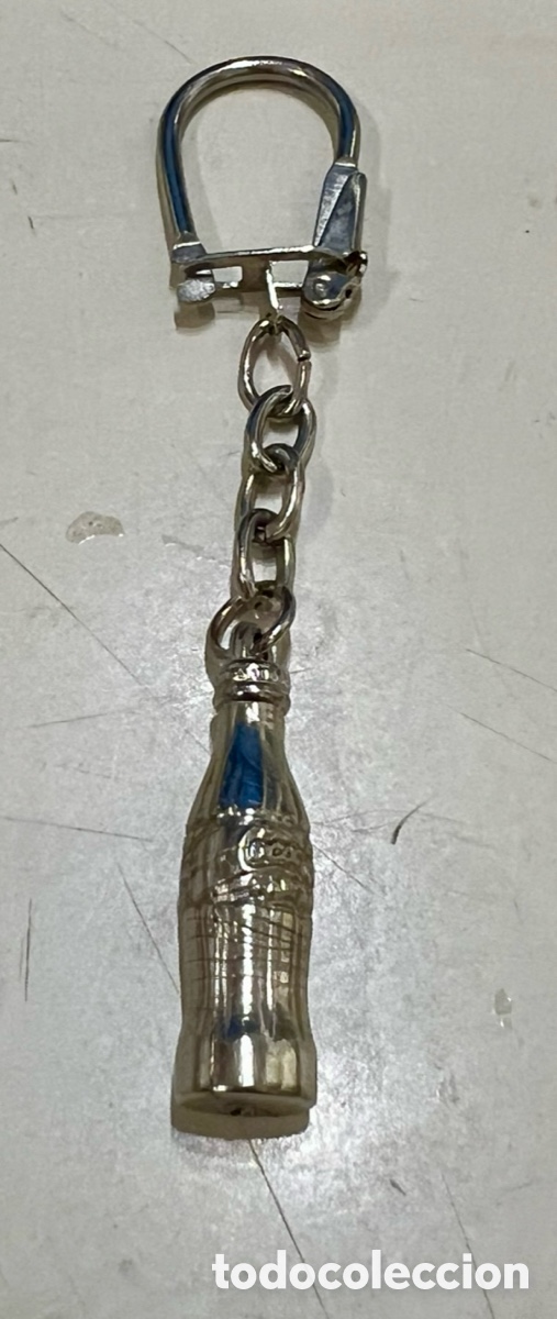 Coleccionismo de llaveros: Llavero. Botella de COCA COLA. Metal. A&ntilde;os 70.