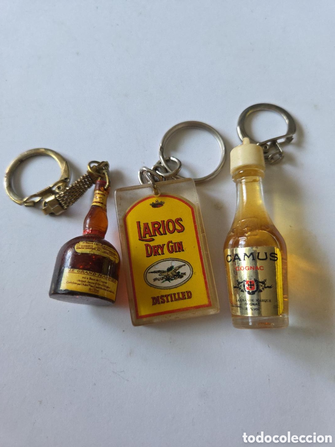 Coleccionismo de llaveros: Lote 3 llaveros vintage bebidas &ndash; Grand Marnier, Larios y Camus