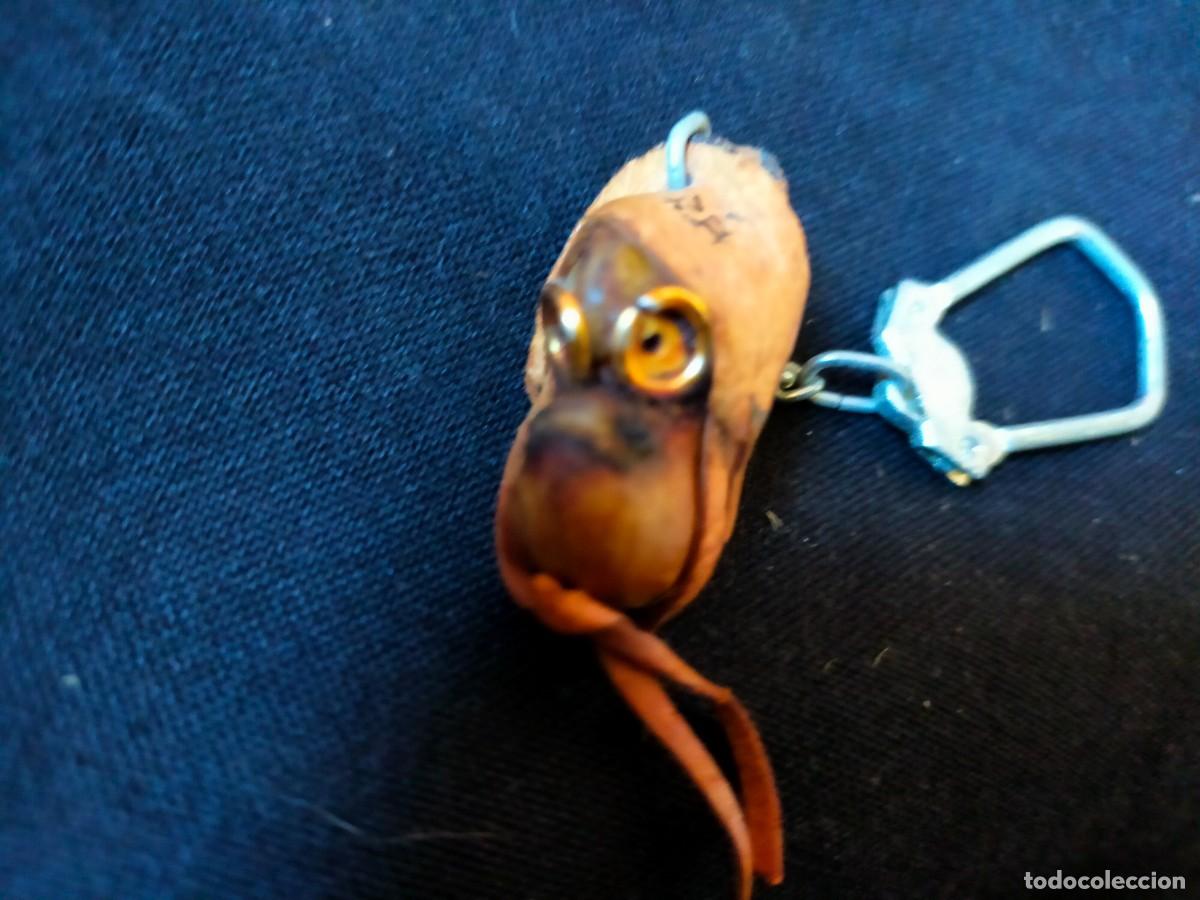 Collection of Keychains: FIGURA FOLCL&Oacute;RICA DE LLAVERO. VINTAGE BRASIL. 70&acute;s. CON CUERO Y SEMILLAS PROTECTORAS