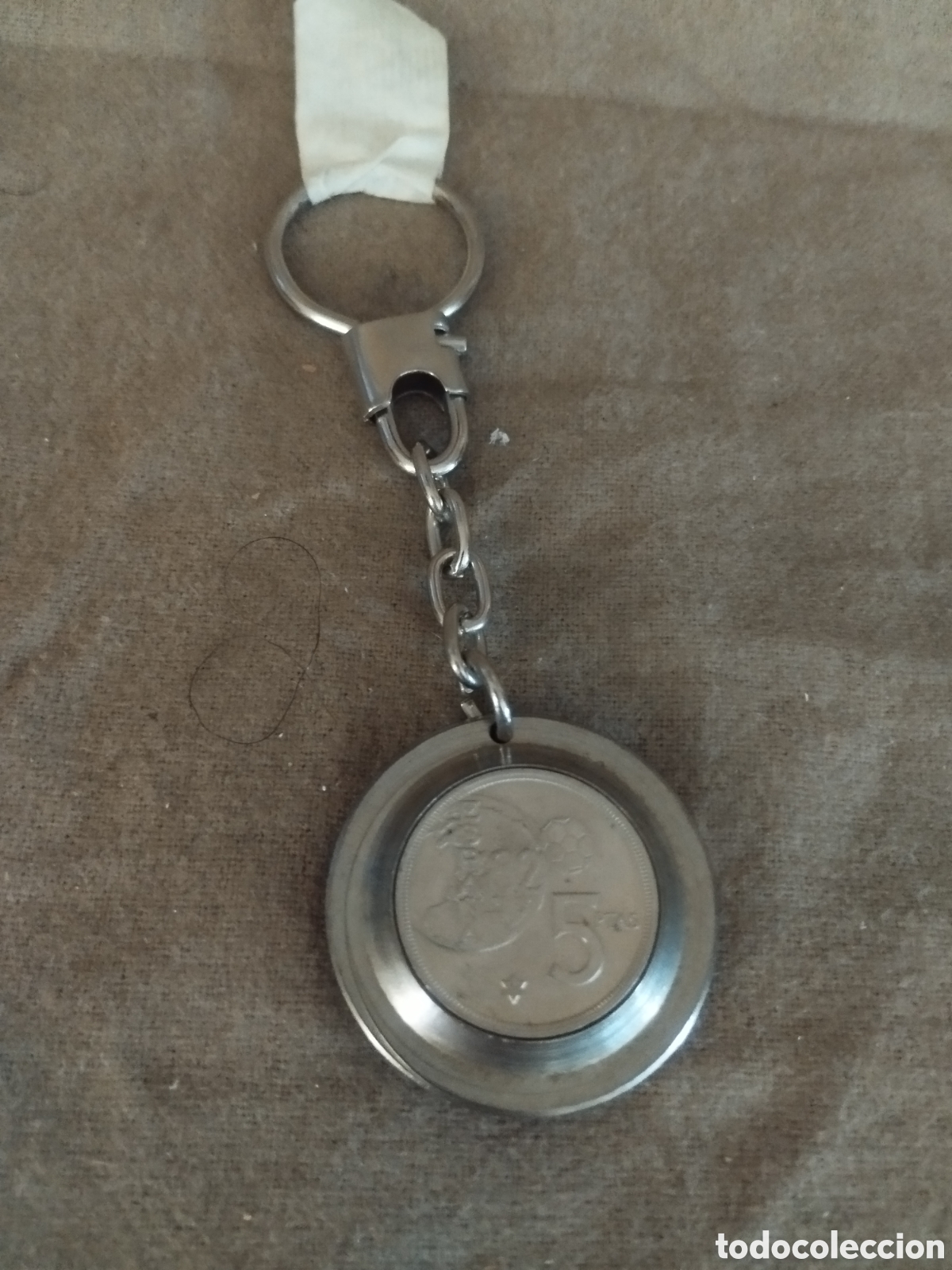 Colecionismo de porta-chaves: Llavero con moneda 1982