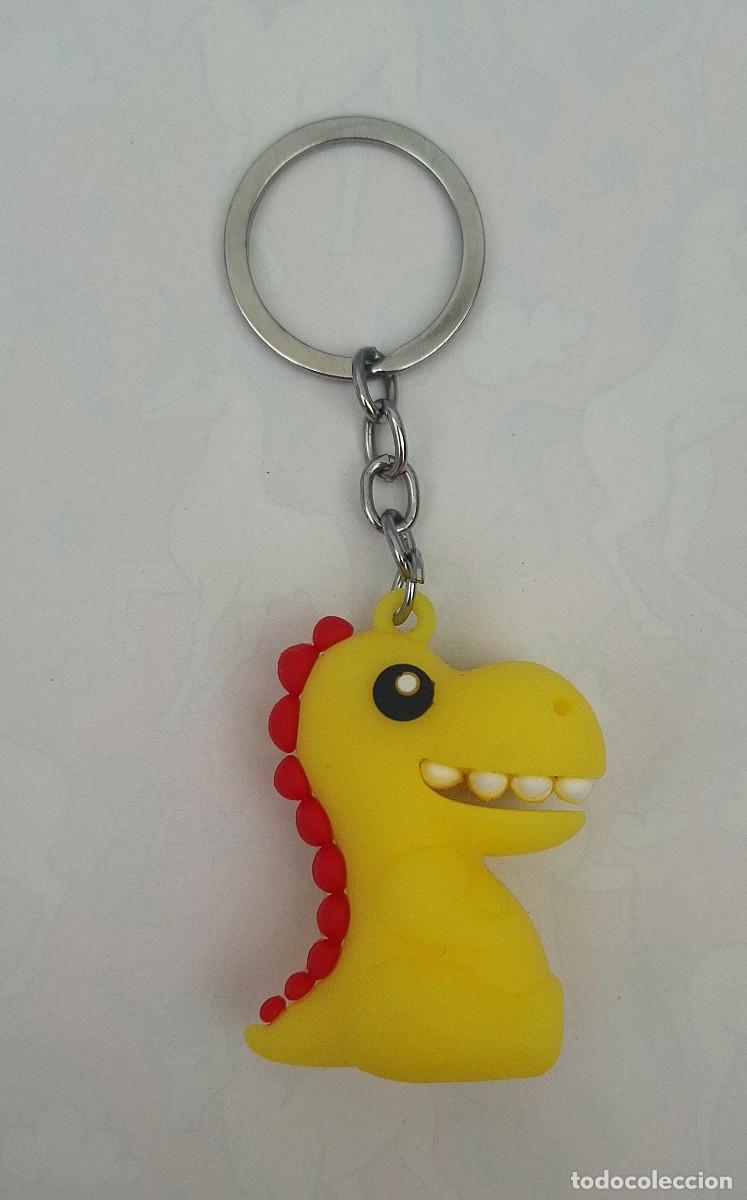 Coleccionismo de llaveros: Llavero dinosaurio amarillo