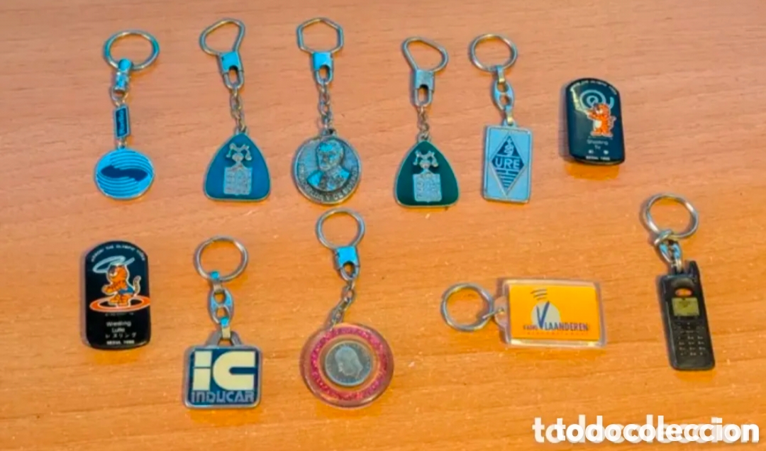 Coleccionismo de llaveros: Lote llaveros Freixenet, chapas, moneda, URE, Airtel e Inducar.