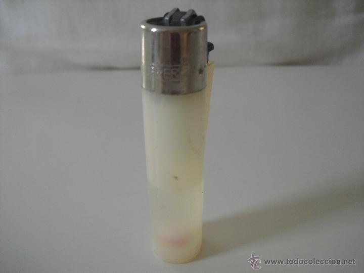Mecheros: Encendedor Clipper sin regulador. Mechero blanco traslucido.