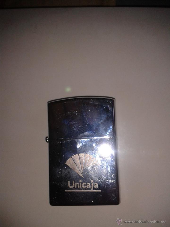 Mecheros: Mechero tipo zippo publicidad de unicaja.nuevo